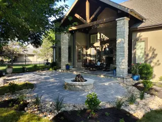 Beautiful fire pit and pergola work by Green Expectations